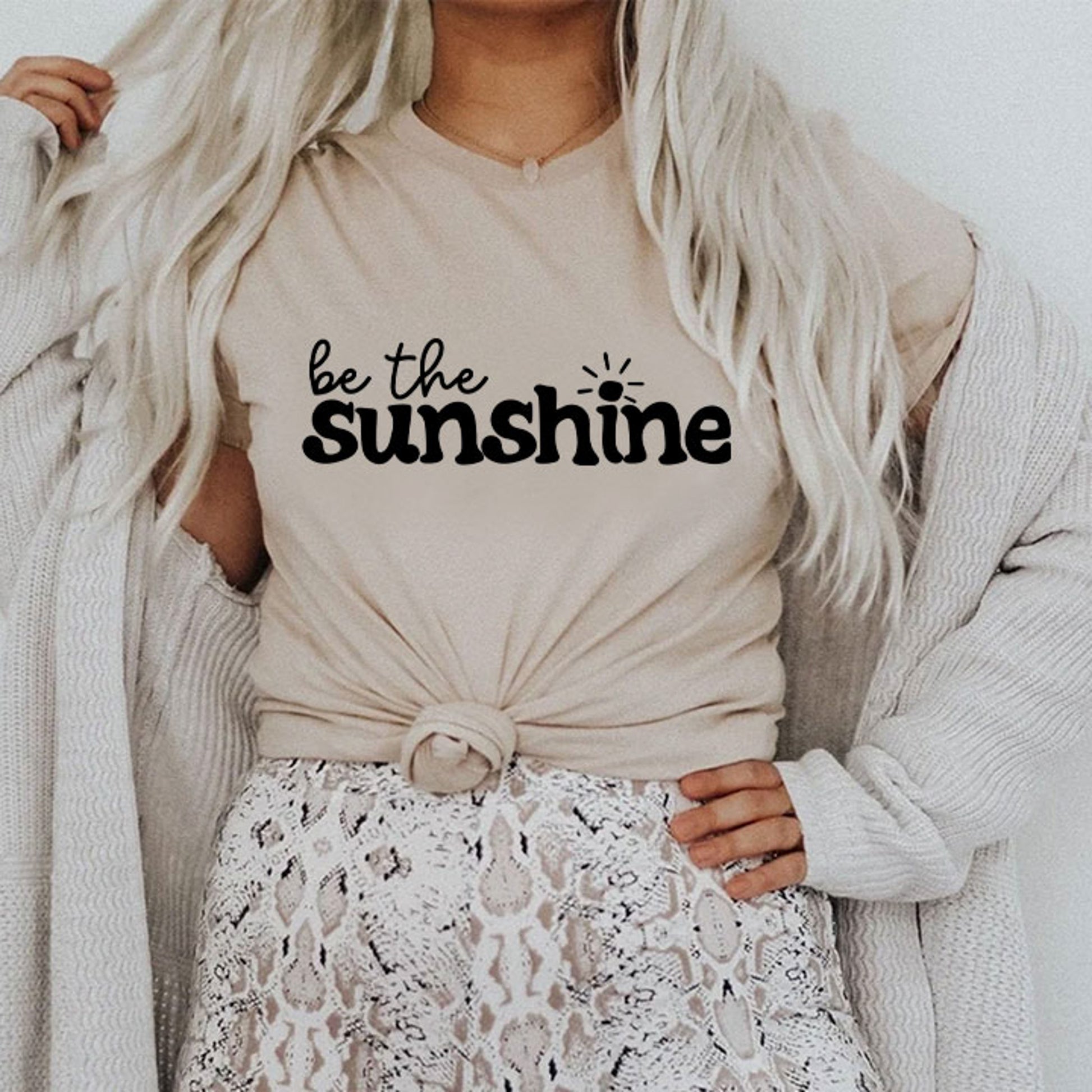 https://www.wildhoneytees.com/cdn/shop/files/Be-the-Sunshine1-2_1946x.jpg?v=1688392242